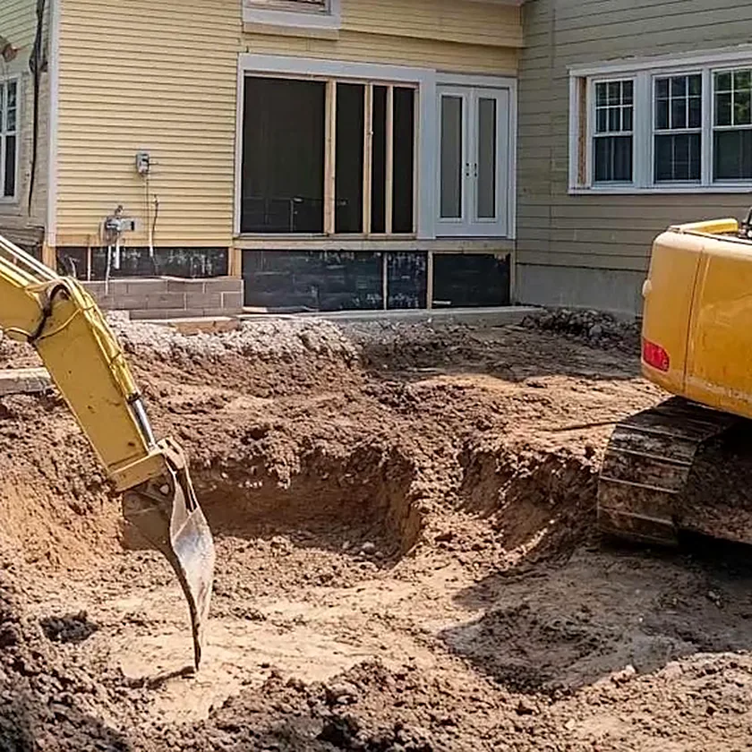 Excavation le long d’une fondation pour réparer une fissure